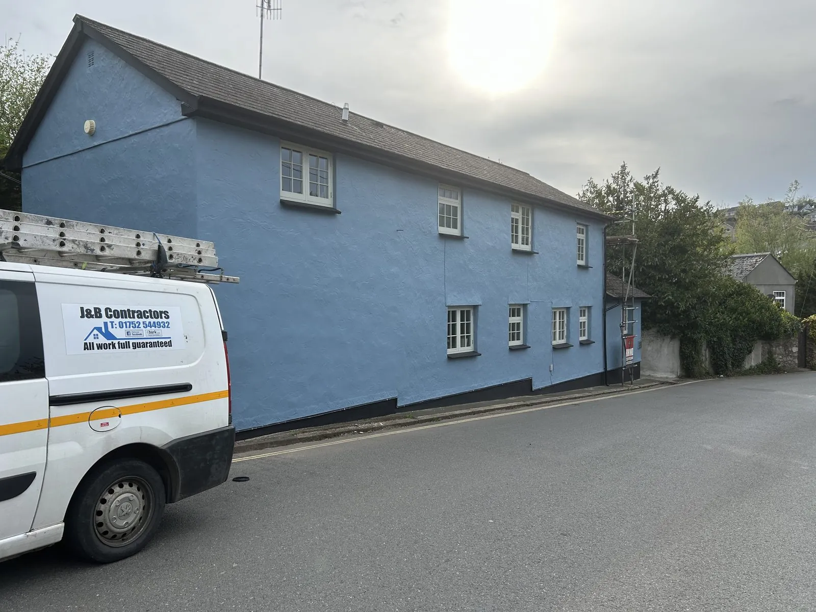 Exterior painting of a detached house in Polperro